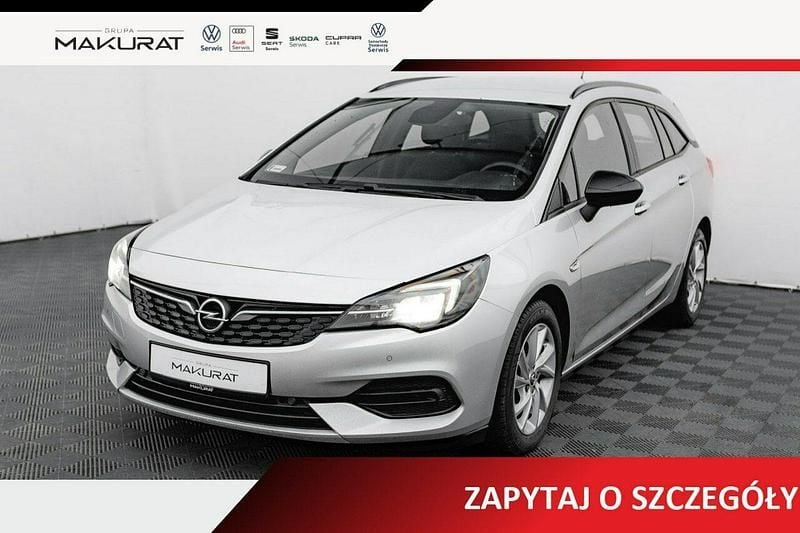 Srebrny (metalik) Używany 2021 Opel Astra Edition Kombi | 38 850 zł (Dobra cena) - Obraz 1/4