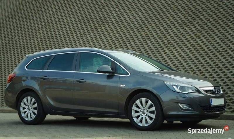 Szary Używany 2011 Opel Astra Kombi | 26 499 zł (Drogi) - Obraz 1/4