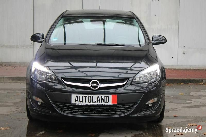 Czarny Używany 2014 Opel Astra Energy Hatchback | 31 333 zł - Obraz 1/4