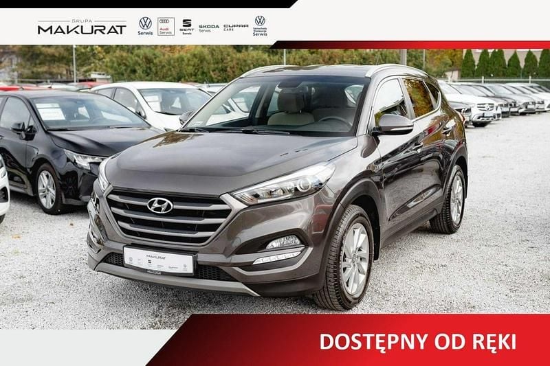 Brązowy Używany 2017 Hyundai Tucson SUV | 64 810 zł (Uczciwa cena) - Obraz 1/4