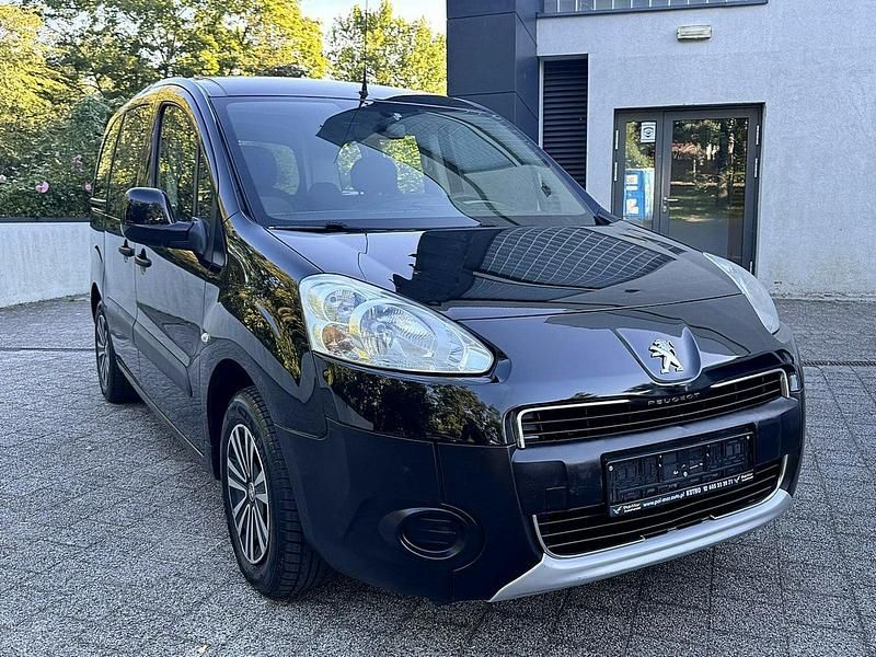 Używany Peugeot Partner 98 KM (72 kW) 2012 Czarny Minivan