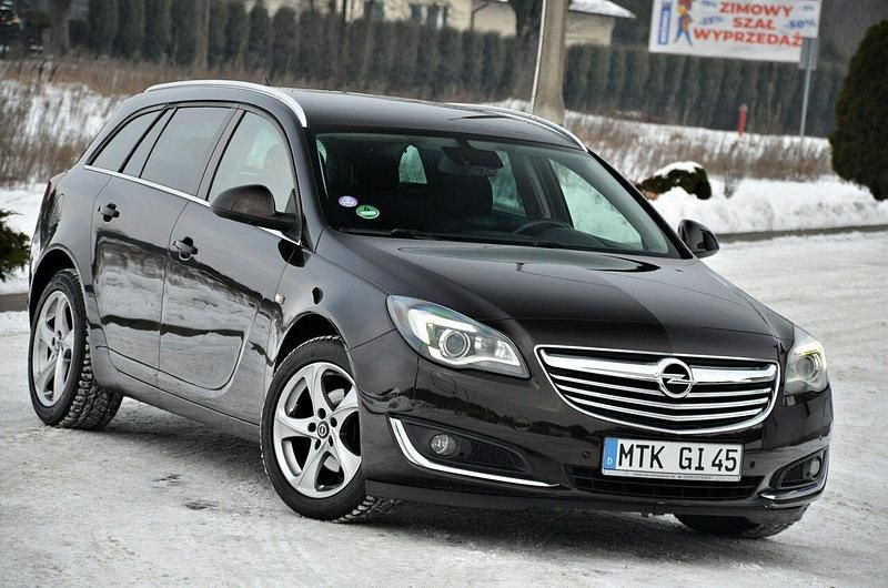 Używany Opel Insignia 140 KM (102 kW) 2014 Brązowy (metalik) Kombi