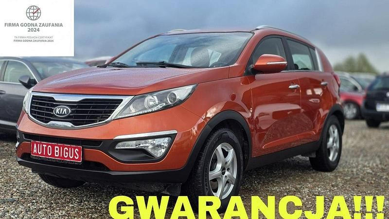 Pomarańczowy (metalik) Używany 2012 Kia Sportage 2 SUV | 35 900 zł (Uczciwa cena) - Obraz 1/4
