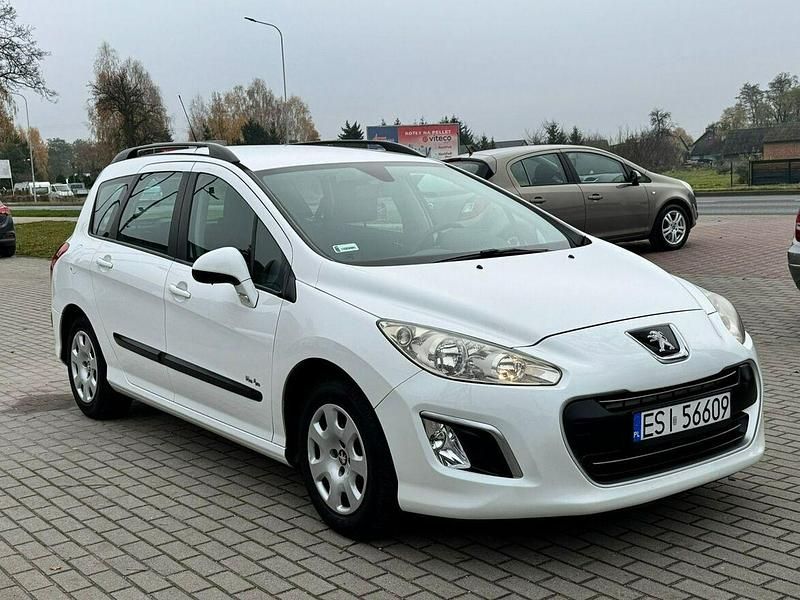Biały Używany 2011 Peugeot 308 Kombi | 11 900 zł (Uczciwa cena) - Obraz 1/4