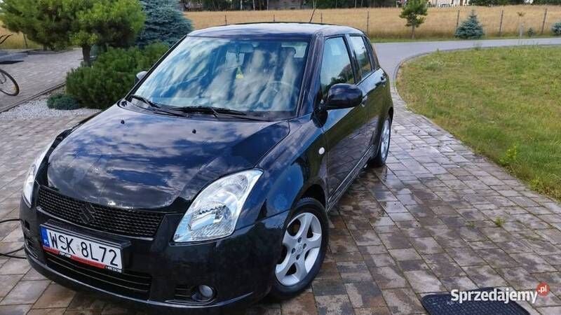 Czarny Używany 2006 Suzuki Swift Hatchback | 8888 zł (Uczciwa cena) - Obraz 1/4