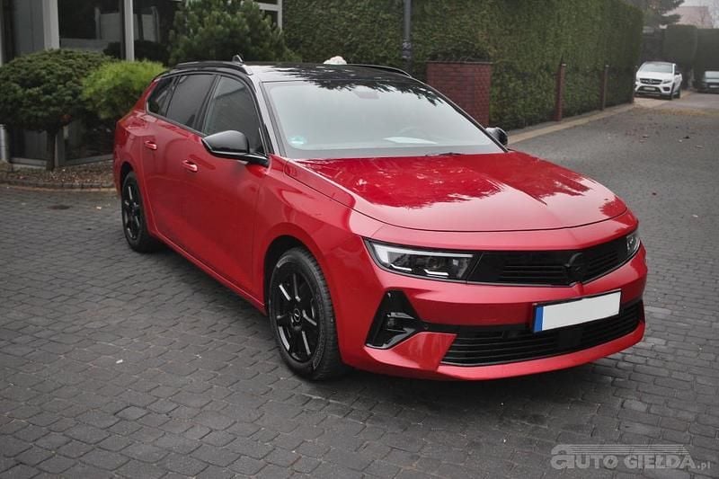 Czerwony Używany 2024 Opel Astra Kombi | 76 500 zł - Obraz 1/4