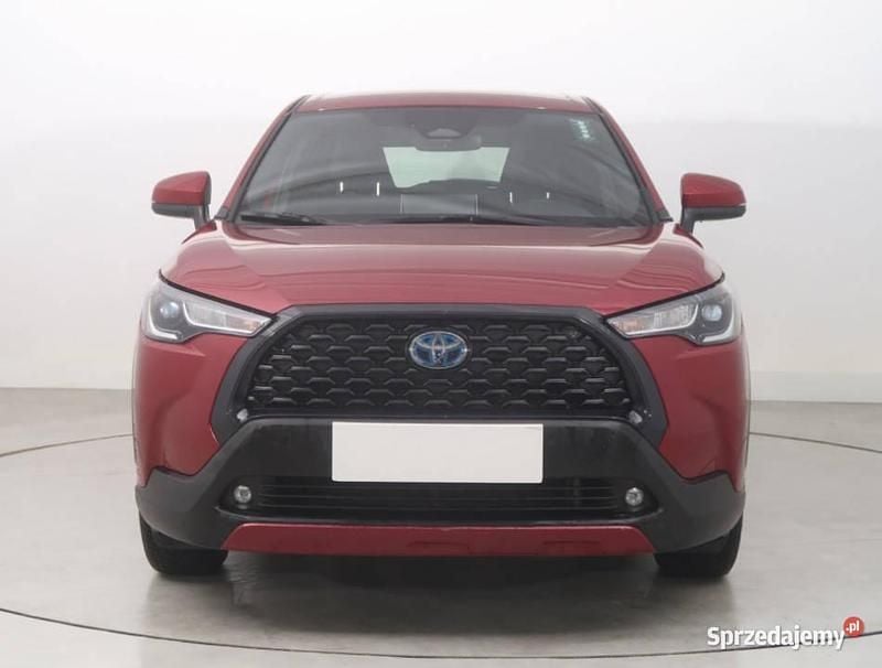 Bordowy Używany 2023 Toyota Corolla Cross SUV | 119 999 zł - Obraz 1/4