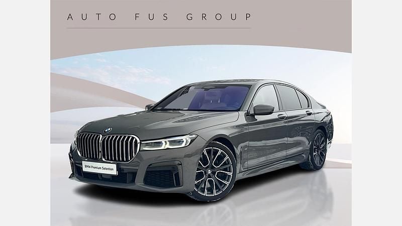 Szary bernina z bursztynowym połyskiem metalizowany Używany 2021 BMW 750L Comfort Edition Sedan/Limuzyna | 249 900 zł - Obraz 1/3