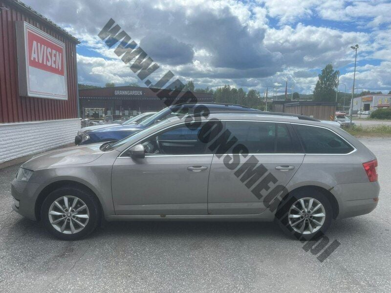 Używany Skoda Octavia 105 KM (77 kW) 2014 Brązowy Kombi