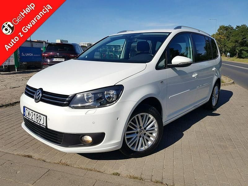 Biały Używany 2014 VW Touran Minivan | 34 500 zł (Uczciwa cena) - Obraz 1/4