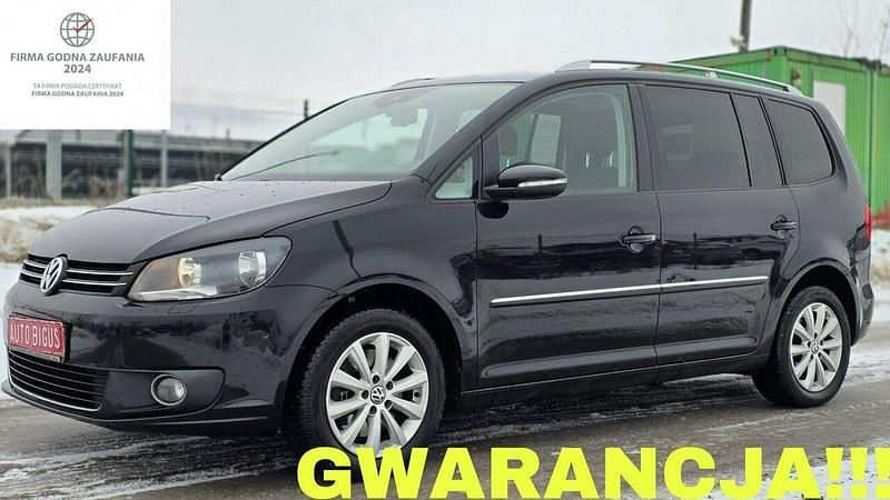 Czarny Używany 2015 VW Touran Highline Minivan | 42 900 zł (Uczciwa cena) - Obraz 1/4
