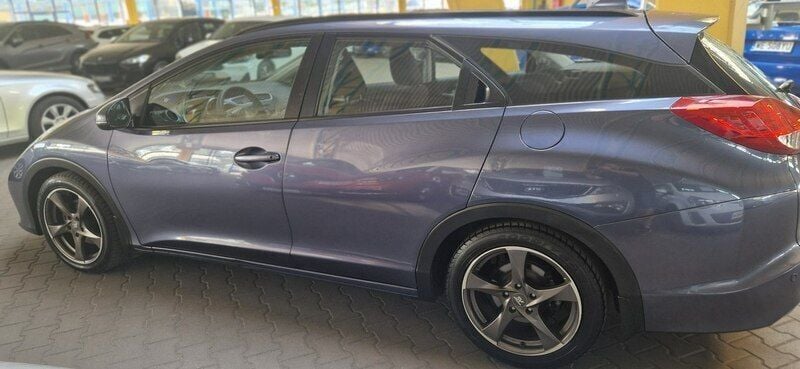 Używany Honda Civic 120 KM (88 kW) 2014 Niebieski Sedan/Limuzyna