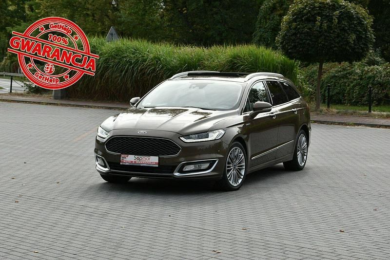 Złoty (metalik, perła) Używany 2016 Ford Mondeo Vignale Kombi | 59 800 zł (Drogi) - Obraz 1/4