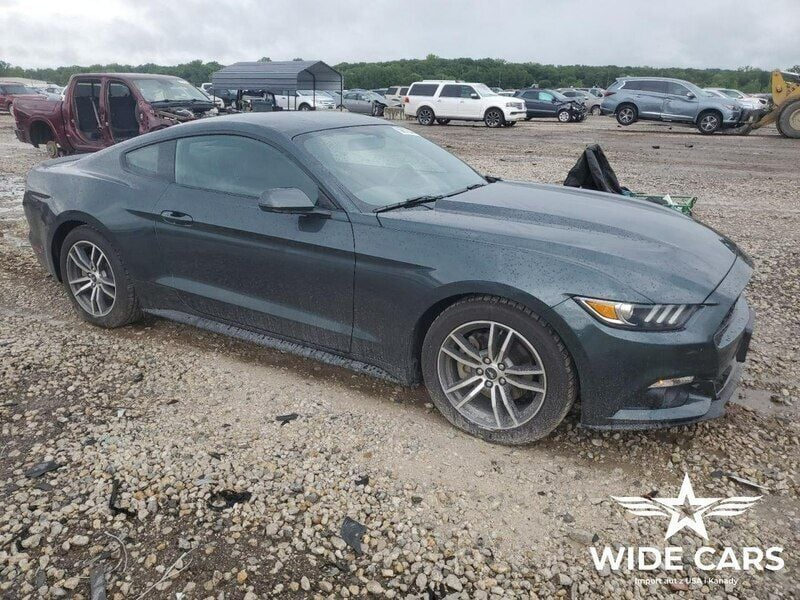 Czarny (metalik) Używany 2015 Ford Mustang Coupe | 39 100 zł - Obraz 1/4