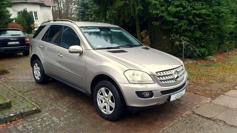 Złoty Używany 2008 Mercedes ML320 AMG SUV | 25 970 zł (Dobra cena) - Obraz 1/4