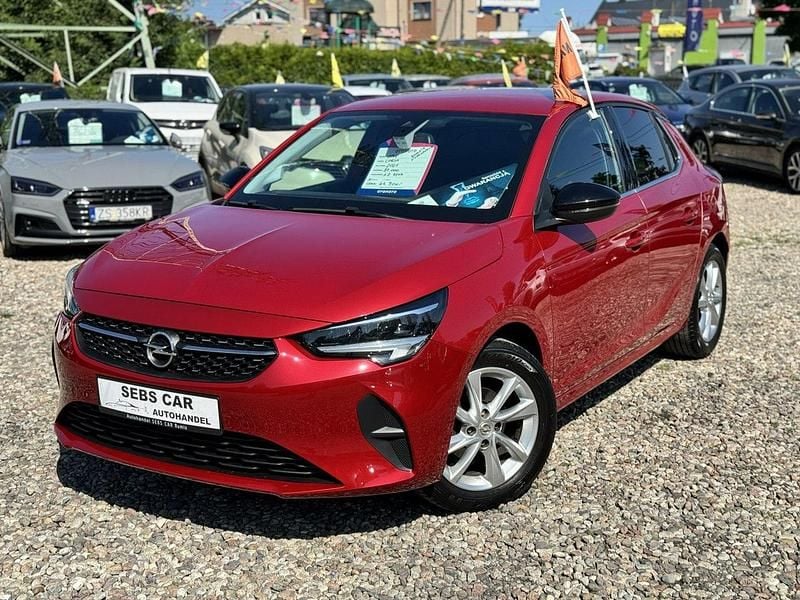 Czerwony ciemny (metalik) Używany 2021 Opel Corsa Hatchback | 44 900 zł (Uczciwa cena) - Obraz 1/4
