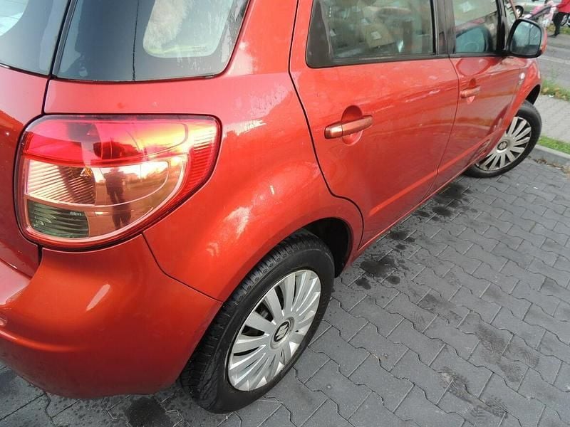 Używany Suzuki SX4 2009 Czerwony Hatchback