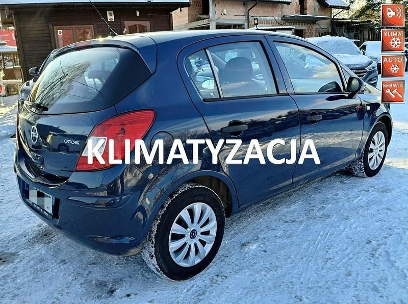 Niebieski ciemny (metalik) Używany 2013 Opel Corsa Hatchback | 14 999 zł (Dobra cena) - Obraz 1/4