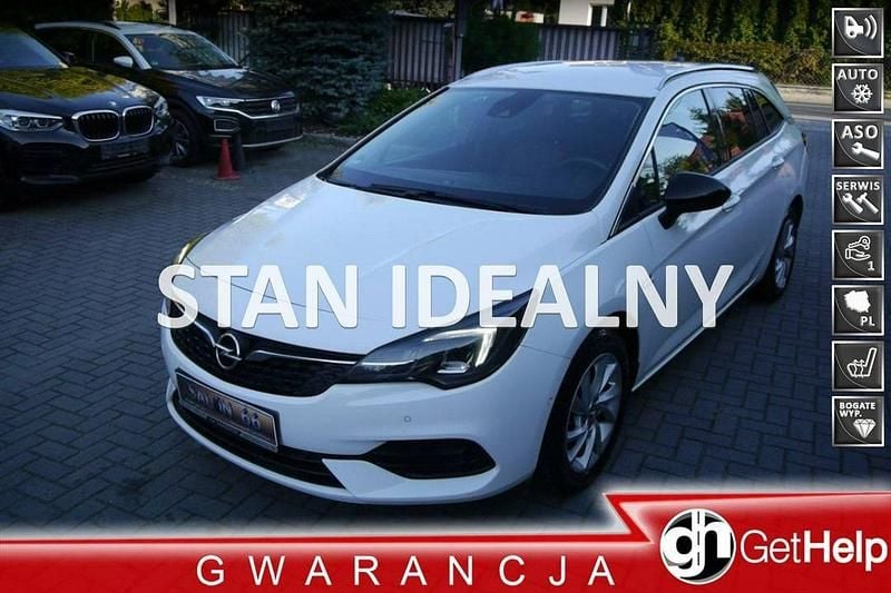Biały Używany 2022 Opel Astra Kombi | 57 900 zł (Uczciwa cena) - Obraz 1/4