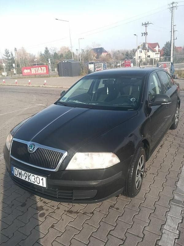 Czarny Używany 2012 Skoda Octavia Sedan/Limuzyna | 10 999 zł (Super Cena) - Obraz 1/4