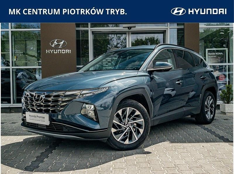 Niebieski ciemny (metalik) Używany 2024 Hyundai Tucson SUV | 118 900 zł (Drogi) - Obraz 1/4