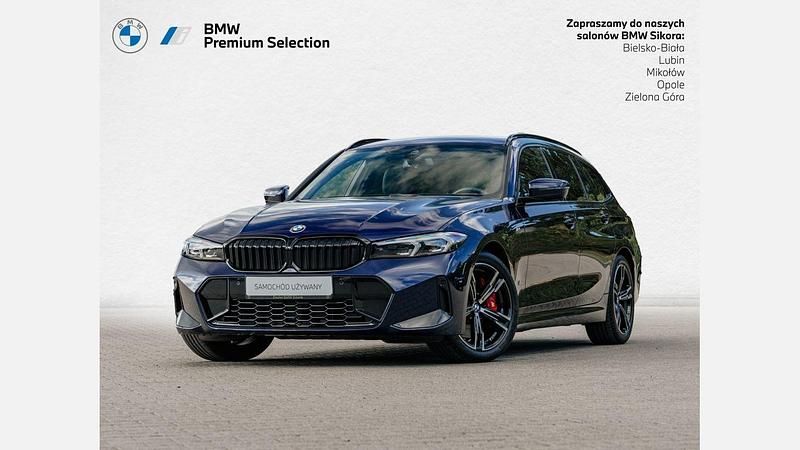 Niebieski tanzanite bmw individual metalizowany Używany 2024 BMW 320 Comfort Edition Kombi | 229 900 zł - Obraz 1/3