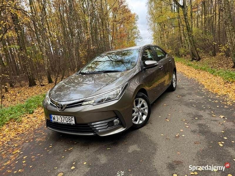 Brązowy Używany 2016 Toyota Corolla Sedan/Limuzyna | 49 990 zł (Uczciwa cena) - Obraz 1/4