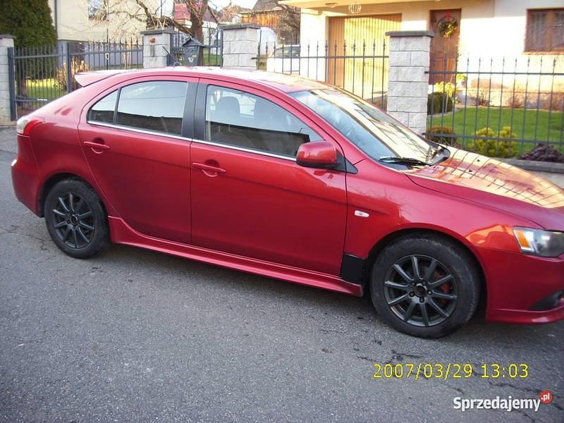 Czerwony Używany 2009 Mitsubishi Lancer Coupe | 13 800 zł - Obraz 1/4