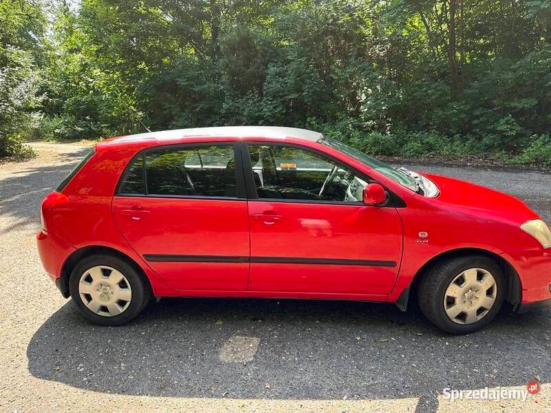 Używany Toyota Corolla 98 KM (72 kW) 2003 Czerwony Hatchback