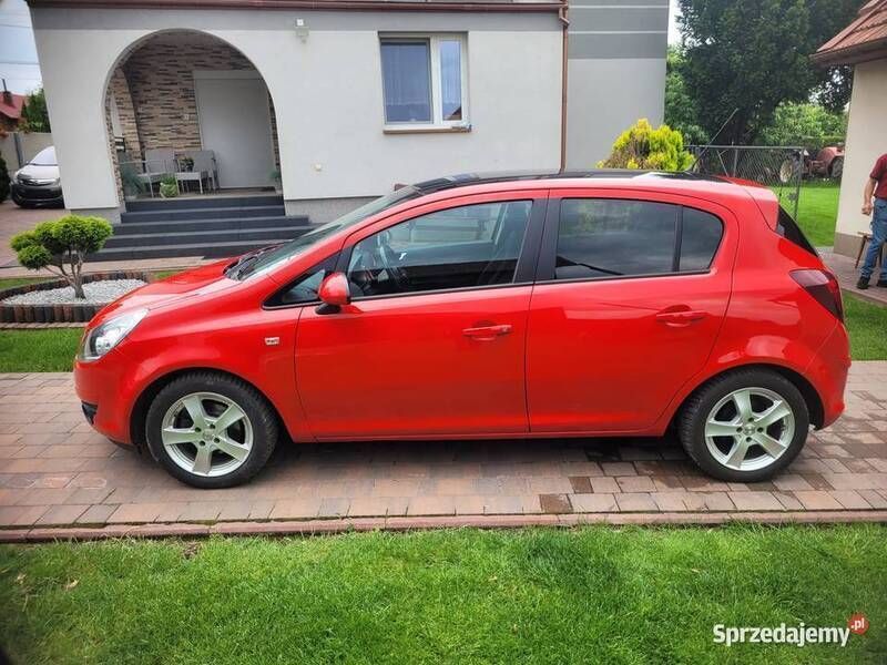 Czerwony Używany 2009 Opel Corsa Hatchback | 13 400 zł (Dość drogi) - Obraz 1/4