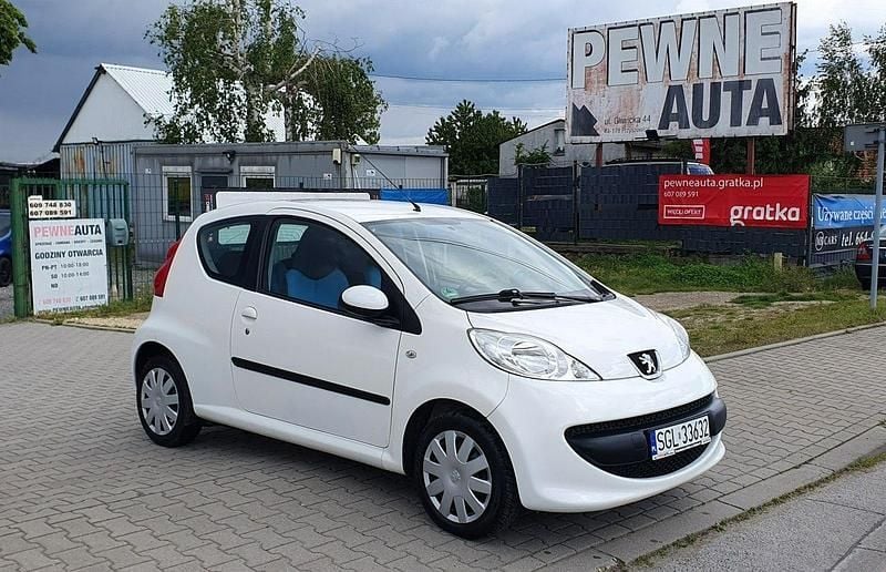 Biały Używany 2009 Peugeot 107 Hatchback | 13 900 zł - Obraz 1/4