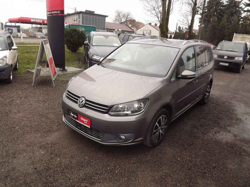 Szary (metalik) Używany 2011 VW Touran Minivan | 29 900 zł (Uczciwa cena) - Obraz 1/4