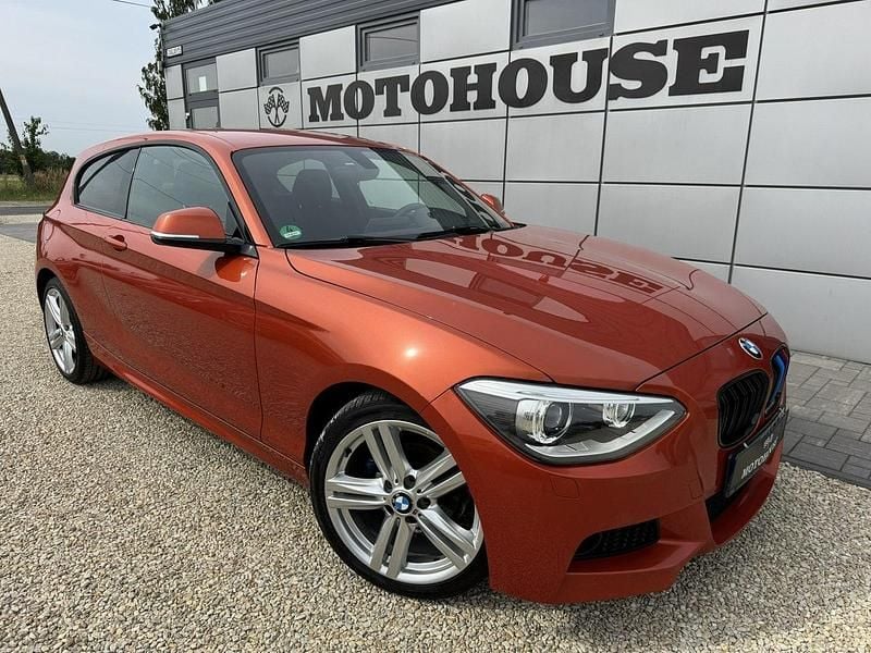 Pomarańczowy Używany 2013 BMW 116 Hatchback | 39 900 zł (Dość drogi) - Obraz 1/4