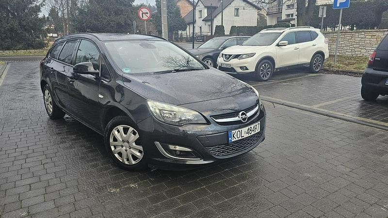 Brązowy Używany 2013 Opel Astra Sedan/Limuzyna | 19 900 zł (Dobra cena) - Obraz 1/4