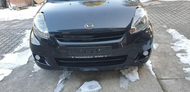 Używany Daihatsu Sirion 91 KM (66 kW) 2009 Czarny Hatchback