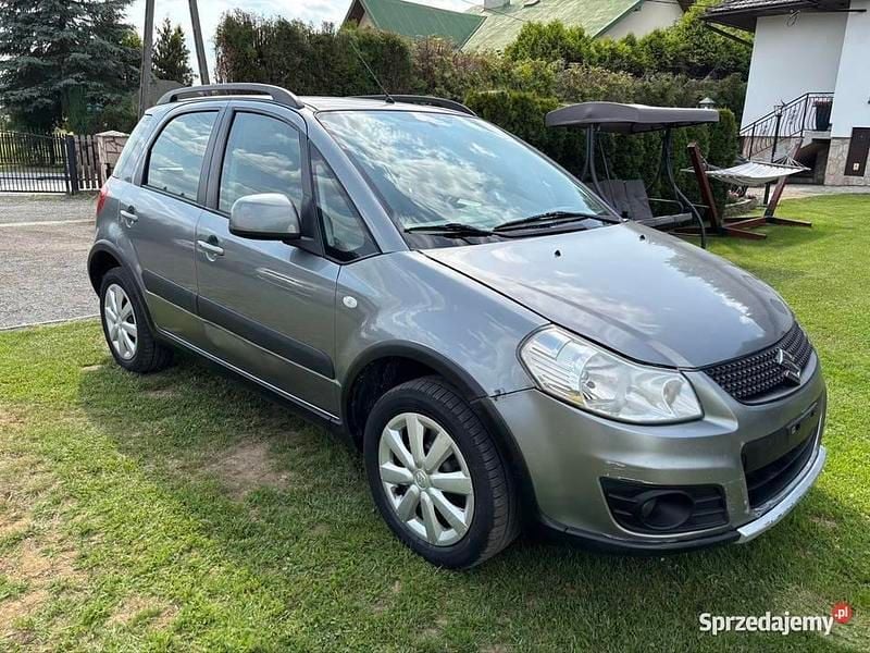 Szary Używany 2011 Suzuki SX4 Sedan/Limuzyna | 13 900 zł (Super Cena) - Obraz 1/4