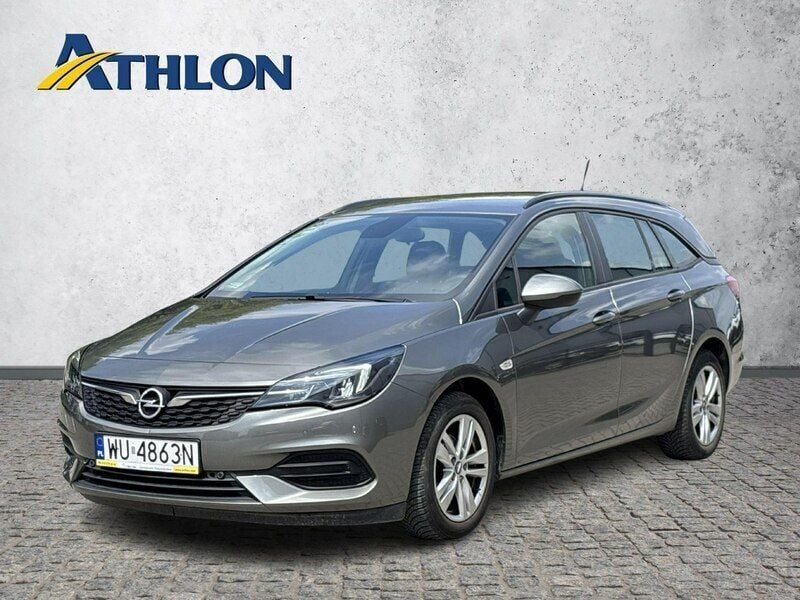 Szary (metalik) Używany 2021 Opel Astra Kombi | 60 600 zł (Uczciwa cena) - Obraz 1/4