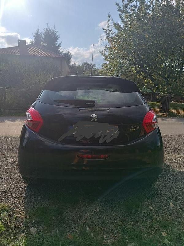 Czarny Używany 2015 Peugeot 208 Hatchback | 31 500 zł (Uczciwa cena) - Obraz 1/4