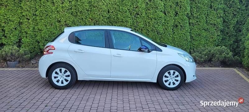 Biały Używany 2014 Peugeot 208 Hatchback | 19 000 zł (Uczciwa cena) - Obraz 1/4