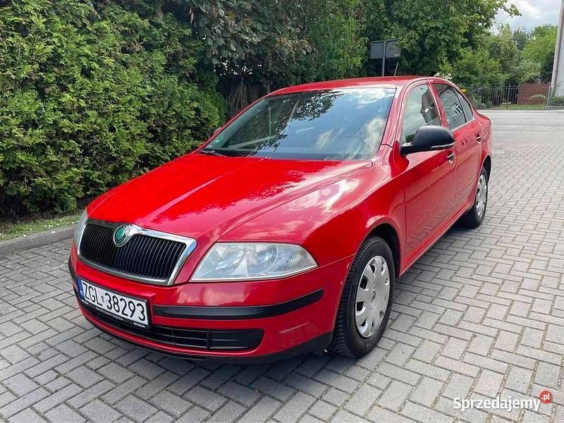 Czerwony Używany 2012 Skoda Octavia Hatchback | 13 200 zł (Uczciwa cena) - Obraz 1/4