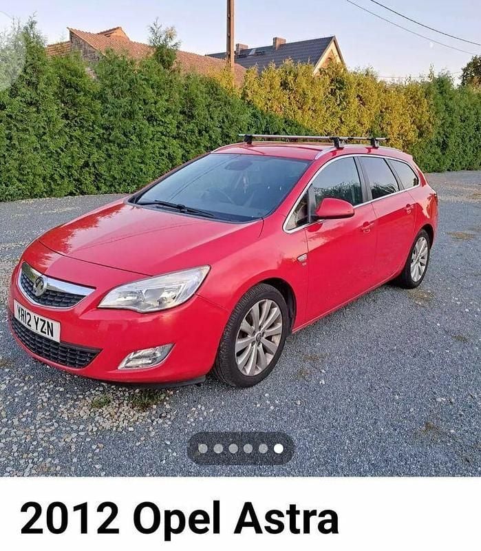 Czerwony Używany 2012 Opel Astra Kombi | 1234 zł - Obraz 1/4