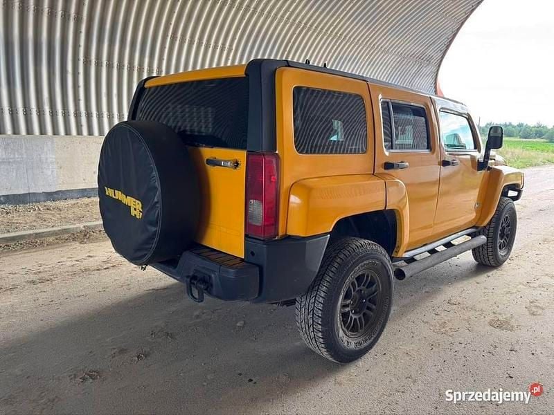 Żółty Używany 2006 Hummer H3 SUV | 30 000 zł - Obraz 1/4
