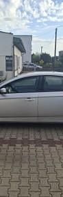 Używany Ford Mondeo 125 KM (91 kW) 2009 Srebrny Hatchback