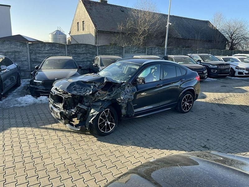 Używany BMW X4 258 KM (189 kW) 2014 Czarny SUV