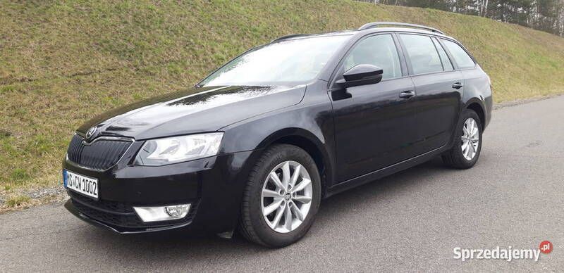 Czarny Używany 2016 Skoda Octavia Kombi | 36 800 zł (Uczciwa cena) - Obraz 1/4