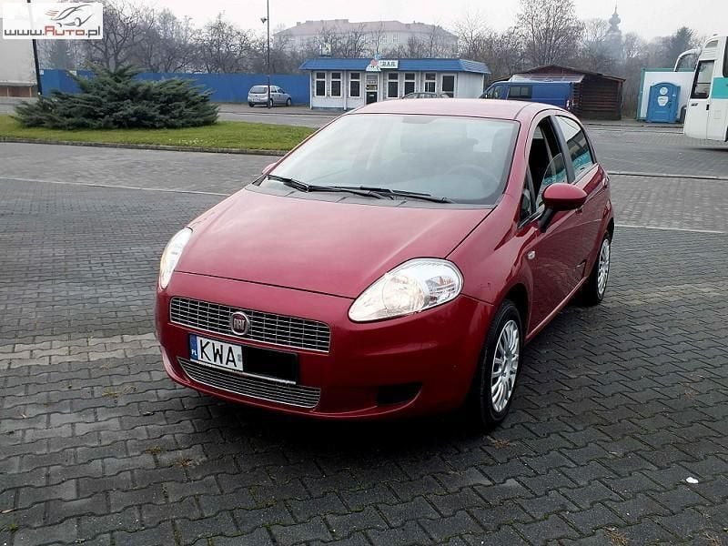 Bordowy Używany 2009 Fiat Grande Punto Hatchback | 21 900 zł - Obraz 1/4