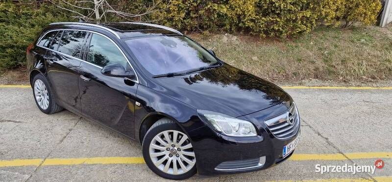 Czarny Używany 2009 Opel Insignia Kombi | 28 700 zł (Uczciwa cena) - Obraz 1/4