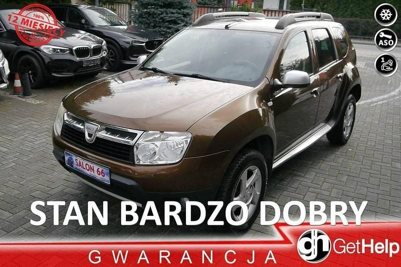 Brązowy Używany 2010 Dacia Duster SUV | 22 600 zł (Uczciwa cena) - Obraz 1/4