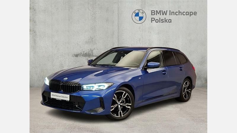 Niebieski portimao m metalizowany Używany 2024 BMW 320 Comfort Edition Kombi | 234 900 zł - Obraz 1/3