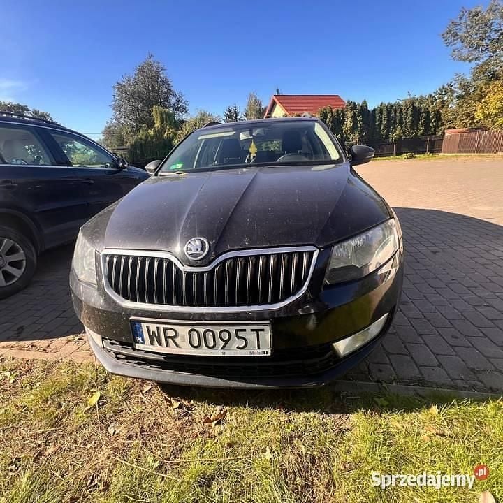 Czarny Używany 2015 Skoda Octavia Kombi | 52 890 zł - Obraz 1/4